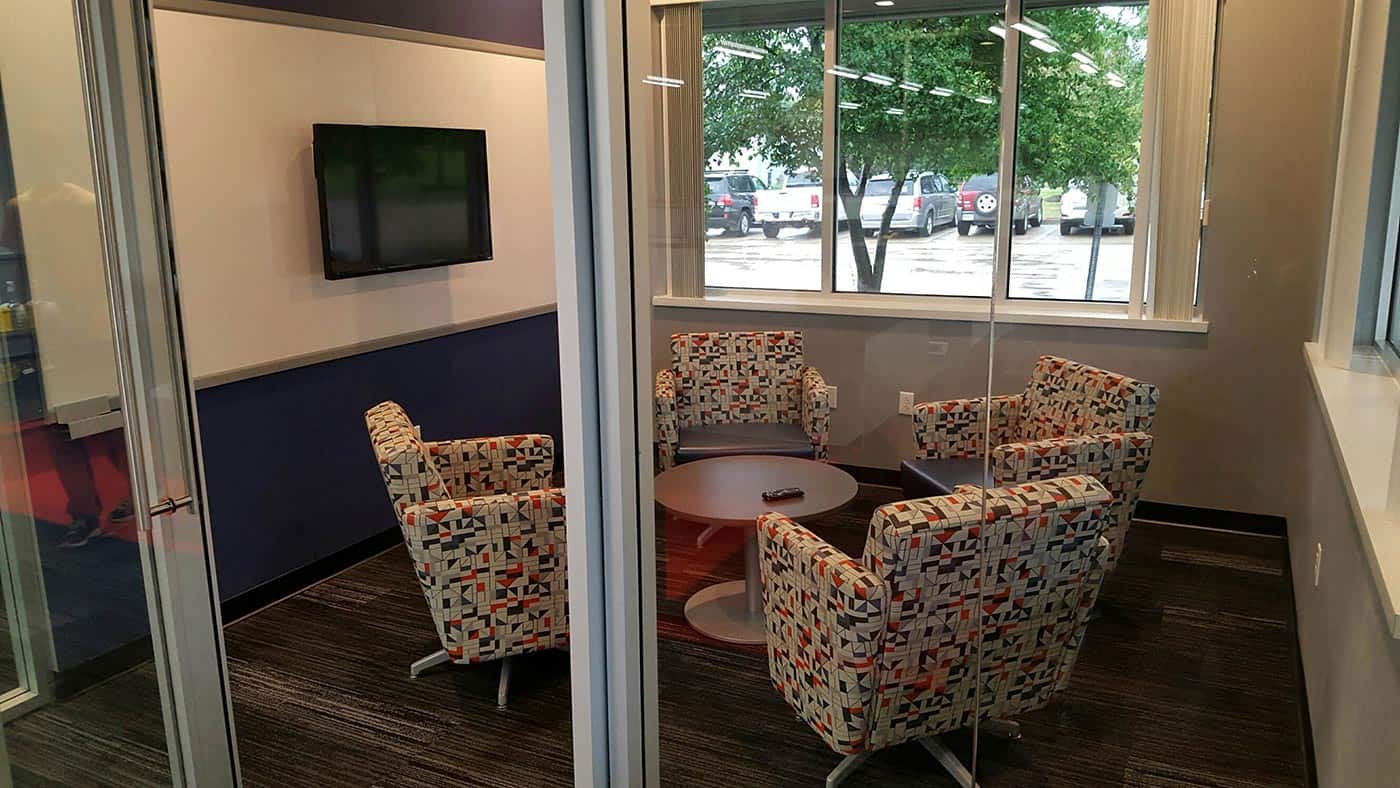 Meeting room with glass walls and door