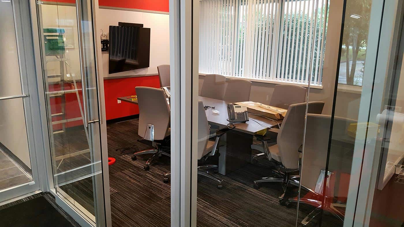 Modern conference room with sliding glass walls